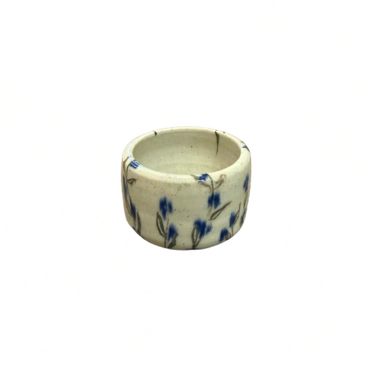Artisan Handcrafted Pottery Bowl with Blue Flowers