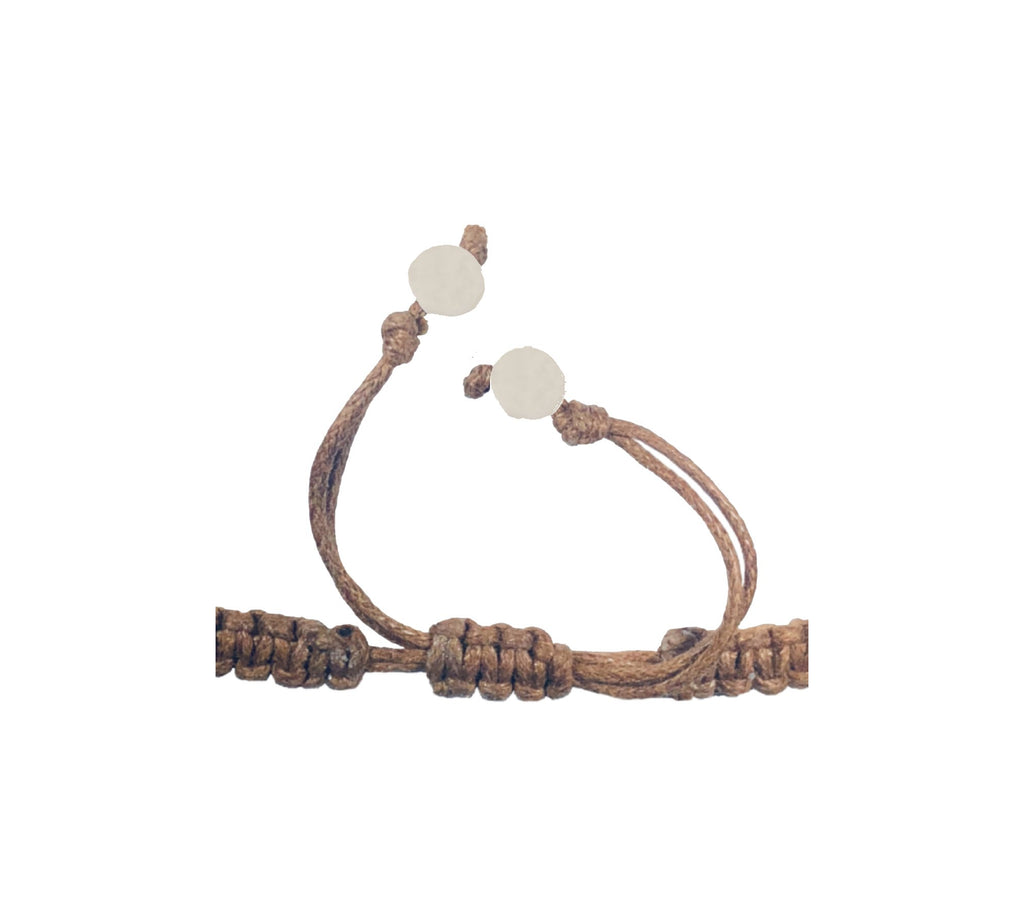 All natural Hand carved Feather Tagua charm on a hand woven cotton bracelet by Tu y Yo (Brown)
