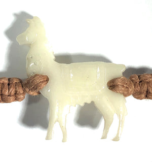All natural Hand carved Llama Tagua charm on a hand woven cotton bracelet by Tu y Yo