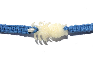 All natural Hand carved Pineapple Tagua charm on a hand woven cotton bracelet by Tu y Yo